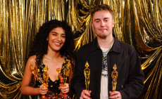 Olivia Dean and Sam Fender pose with their BRIT Award 2026 for Rein Me In